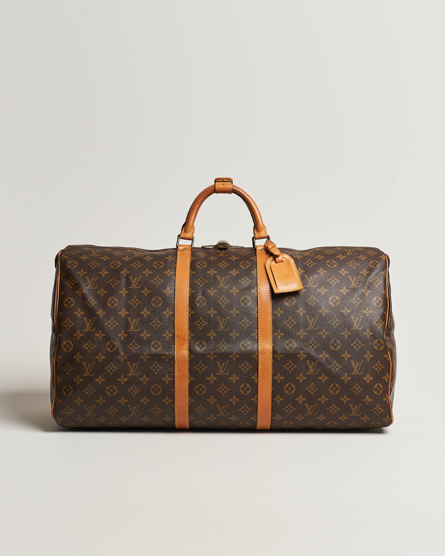 Louis Vuitton Pre-Owned Alizé 1 Poche Garment Travel Bag Monogram at CareOf