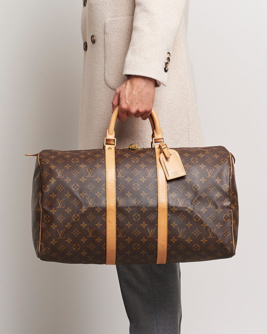 Bonhams Cars : Louis VUITTON, année 2012. Sac KeepAll 55 c en toile  Monogram et cuir naturel