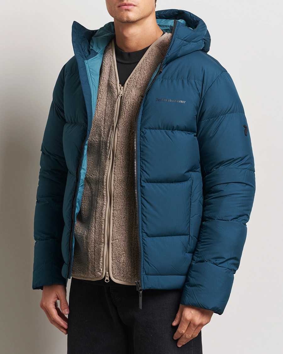 Herre |  | Peak Performance | Rivel Down Hooded Jacket Ininity Teel